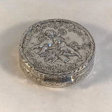 Load image into Gallery viewer, Modern Round Silver Box Embossed With Putti And Cherubs London Import Marks
